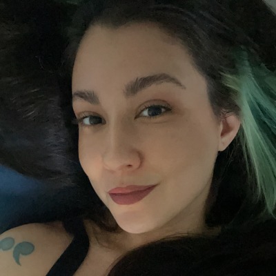 Gia Olimp took a selfie after coloring her hair green.